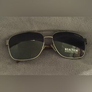 Kenneth Cole Sunglasses, Brown & Silver Colored frame.